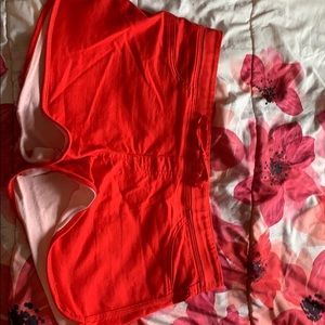 Red mid rise shorts